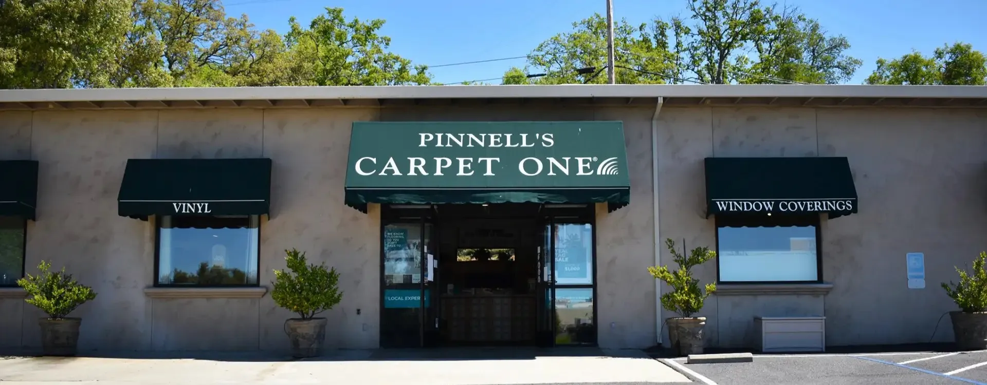 Pinnell's Carpet One Floor & Home showroom building entrance.