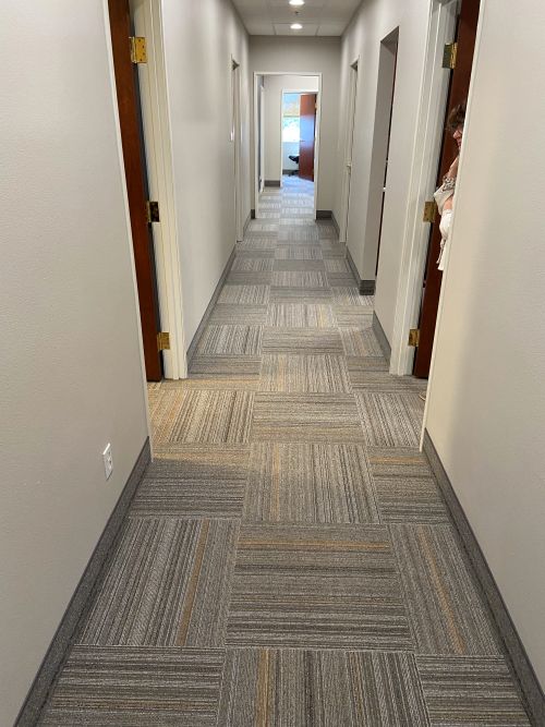 Commercial carpet tile in office hallway