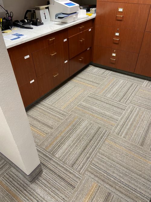filing cabinets & carpet tile floor 