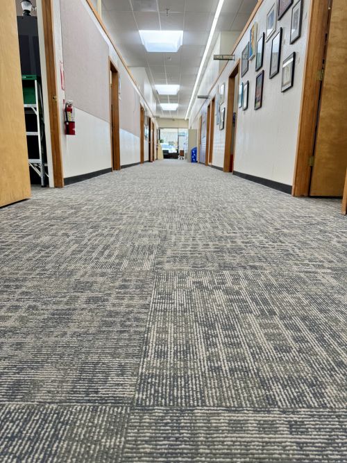 School hallway with commercial carpeting 