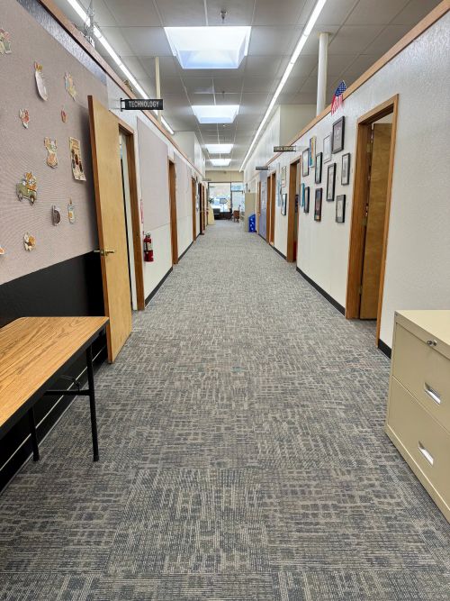Installing carpet tile at a school 